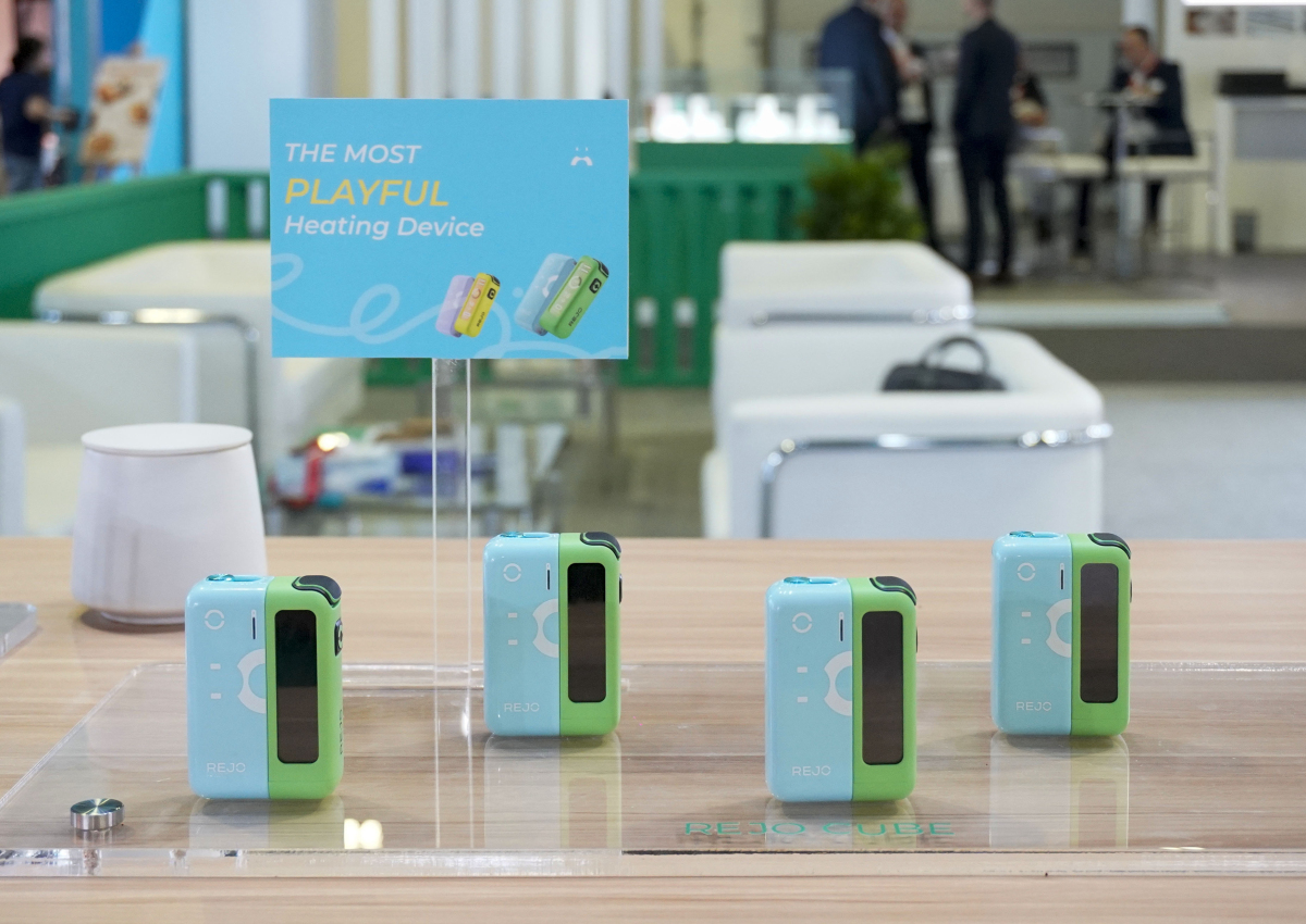 Heaven Gifts' HNB brand REJO launches new product REJO CUBE at WTME in Dubai, featuring similar design to ELFBAR JOINOne Series. REJO focuses on Middle East market, strengthening team and presence in Dubai. REJO CUBE reflects industry trend of HNB product